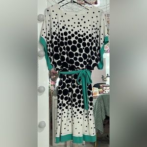 Polka dotted dress with teal accents